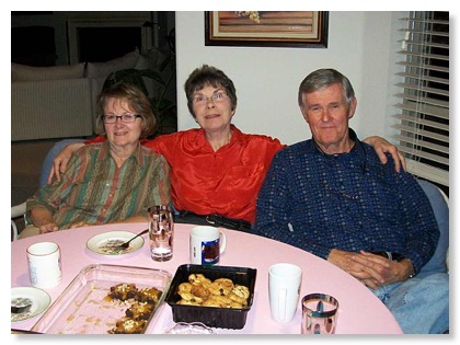 Lorraine, Barbara, and Bob relax after dinner.